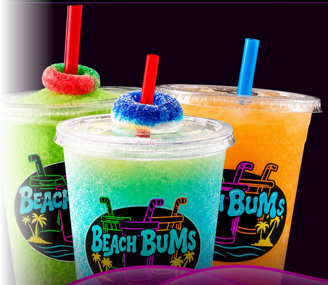 Three Beach Bums frozen drinks with candy ring straw garnishes